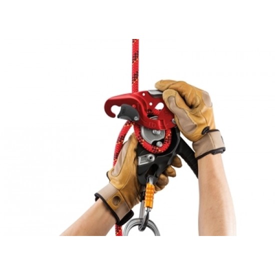 A person is holding a 7020 PETZL I’D "L" with a hook attached to it.