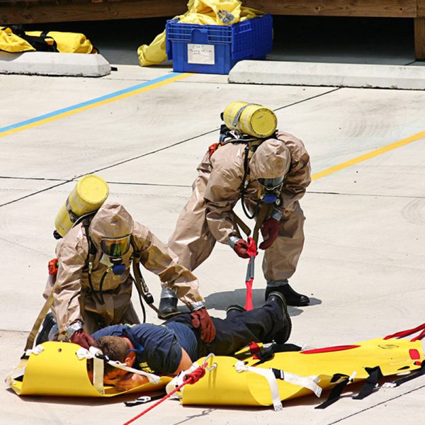 A man on a Shuttle Sked® Rope Kit in Yellow Bag.