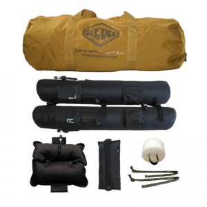 A Sked® Rapid Deployment System – Coyote Brown with a bag, a bag, and other items.