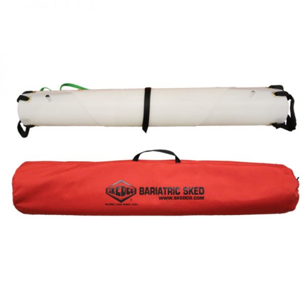 A red and white Bariatric Sked® Stretcher with a bag attached to it.