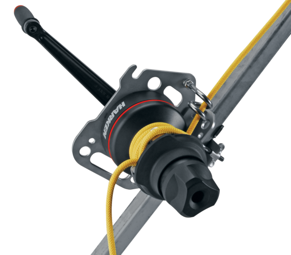 A yellow and black HARKEN LOKHEAD WINCH KIT (NFPA) attached to a pole.