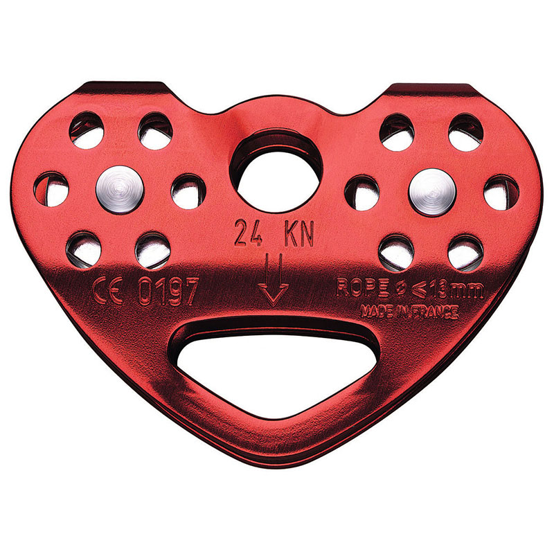 A red heart shaped PRO TRAXION on a white background.