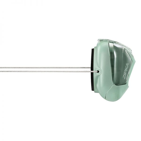 A green device with a handle attached to it.