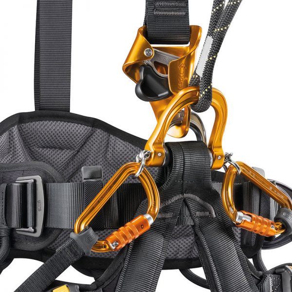 A climbing harness with the VOLT® international version attached to it.
