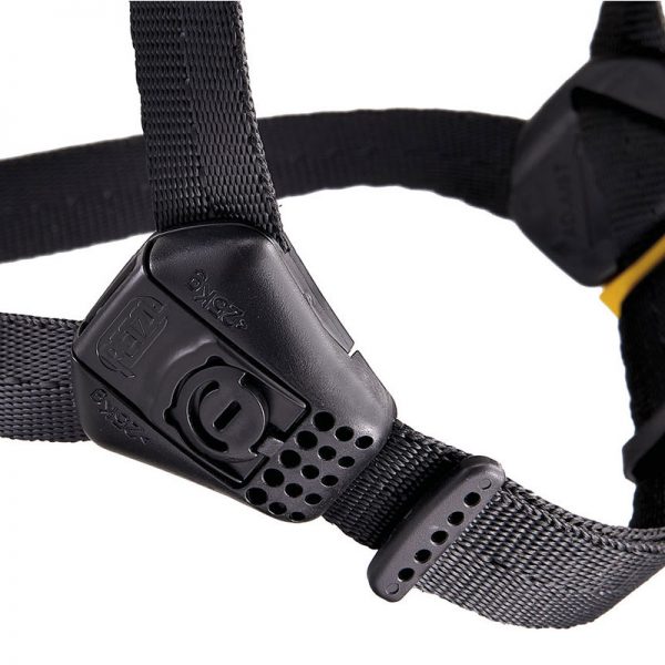 A black VERTEX® dog harness with a yellow buckle.