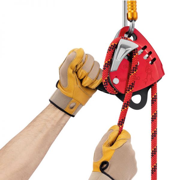 A pair of MAESTRO® S hands holding a rope and a climbing harness.