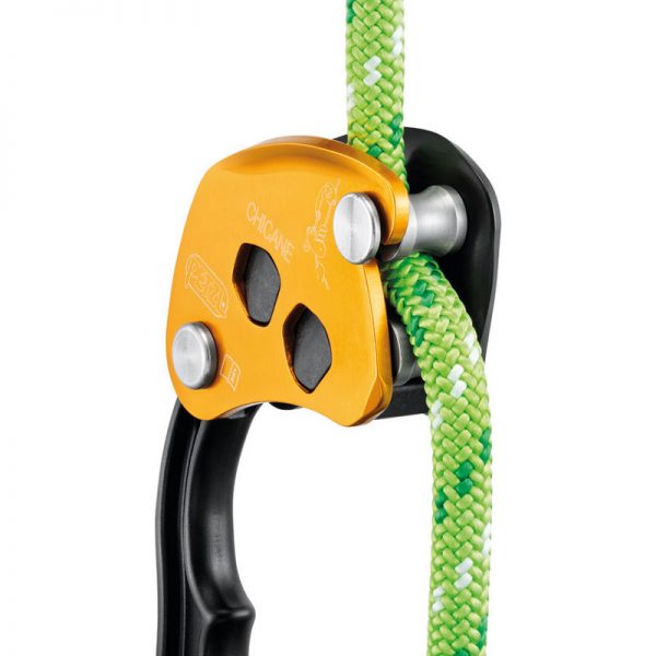A yellow and green ZIGZAG® carabiner on a white background.