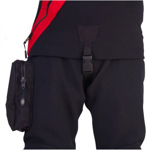 A man is wearing a pair of CF200X DRYSUIT pants with a red pocket.