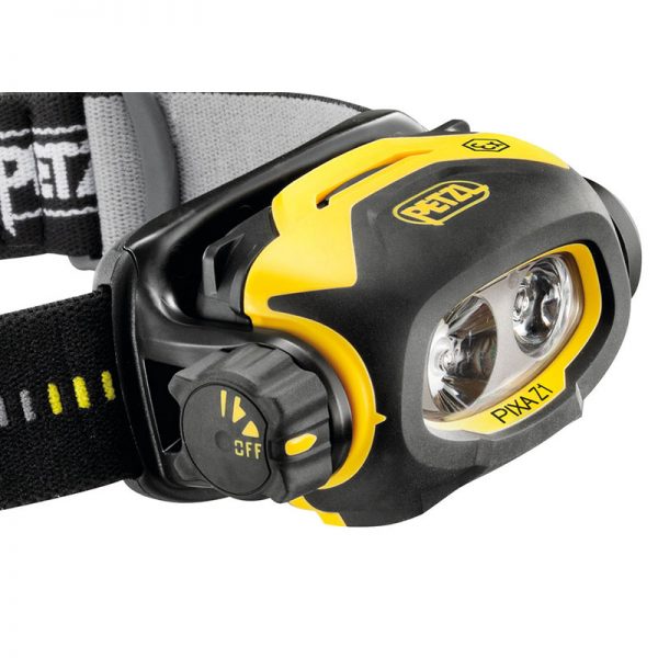A yellow and black headlamp with a strap.