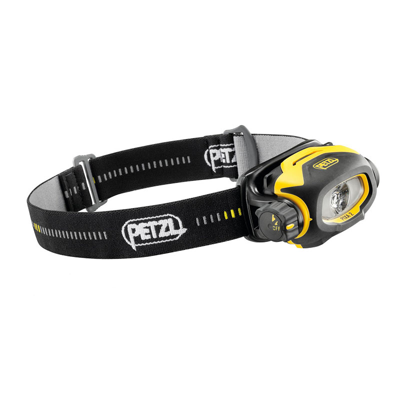 A yellow and black headlamp on a white background.