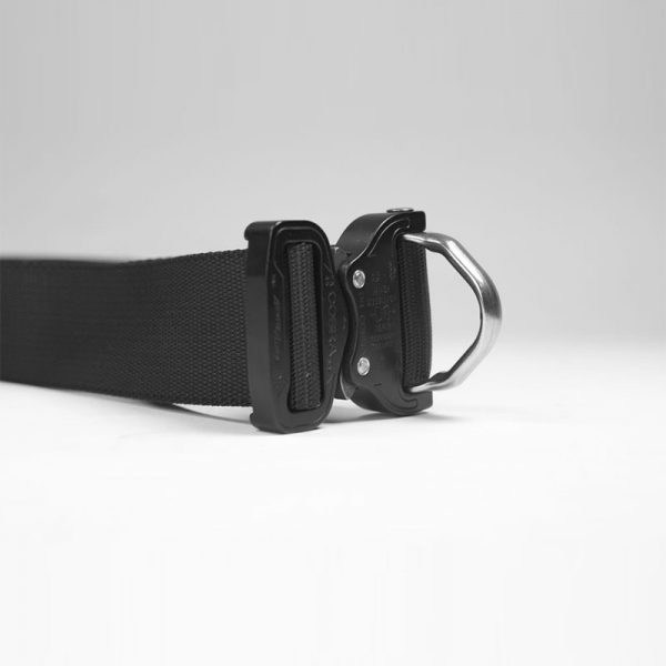 A black HARNESS with a metal buckle on a white background.