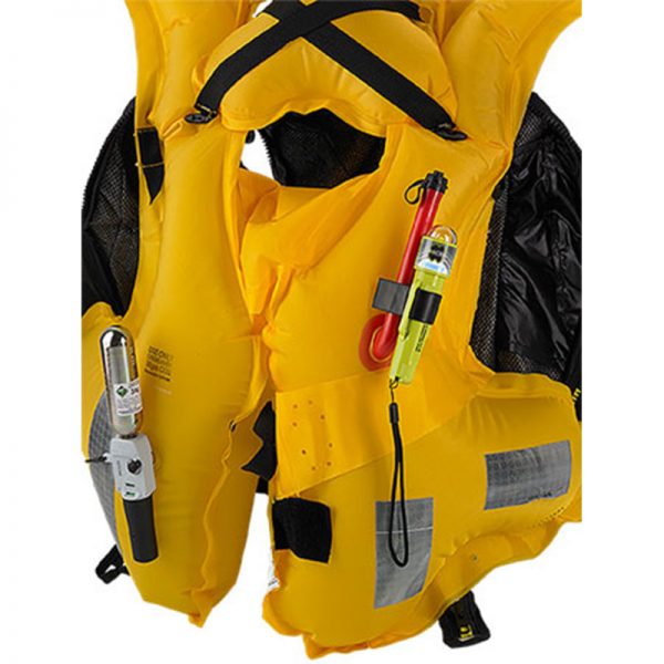 A yellow life jacket with a flashlight attached to it.