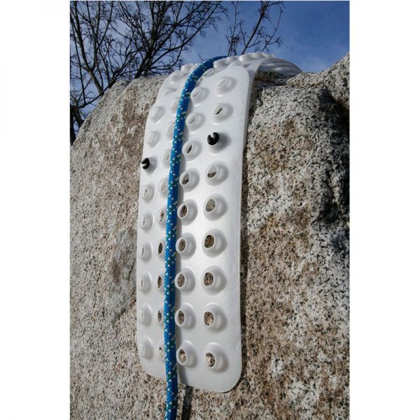 A rock with a blue and white Rope Tracker hanging from it.