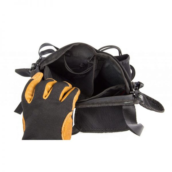 A pair of black HARNESS gloves and a black HARNESS bag.