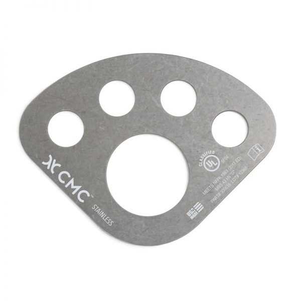 A metal plate with four holes on it.