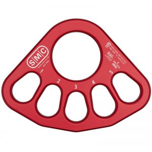 A red SMC Rigging Plate with four holes on it.