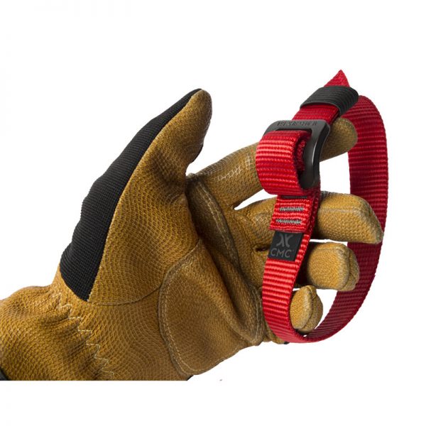 A man's hand holding a red STRAP.