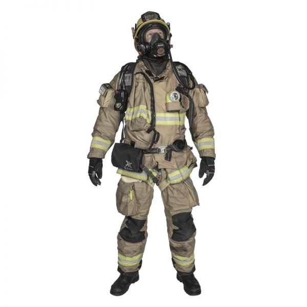A firefighter in a SYSTEM suit standing on a white background.