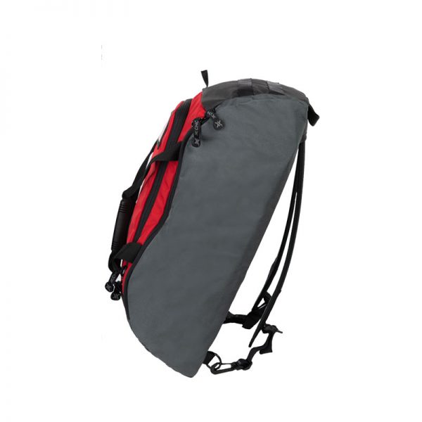 A grey and red SYSTEM backpack on a white background.