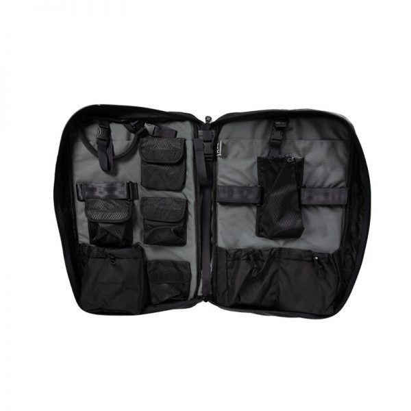 A black SYSTEM carry case with a lot of compartments.