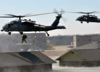 Two helicopters above two houses