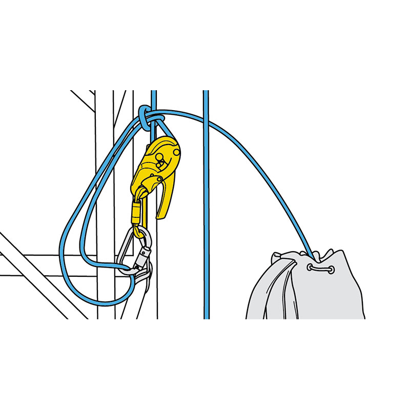 A drawing of a releasable anchor with the RIG: lowering system pre-installed on the ground with a bag attached to it.
