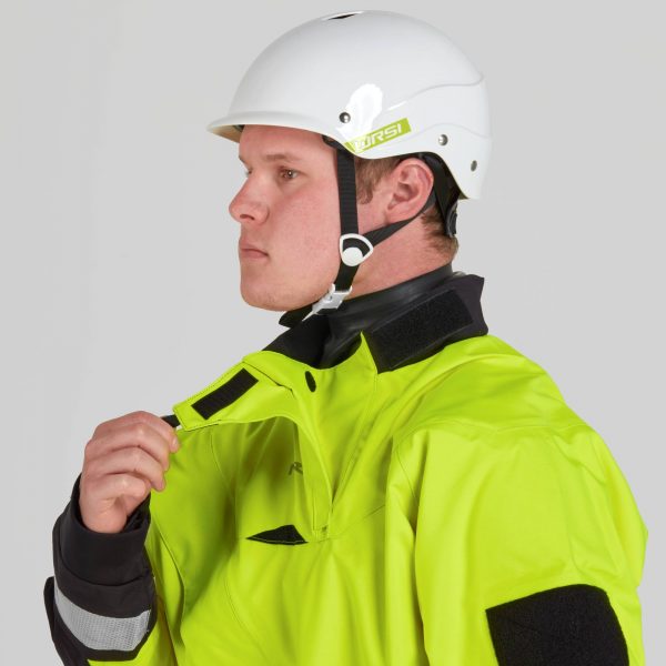 A man in a yellow jacket is adjusting his helmet.